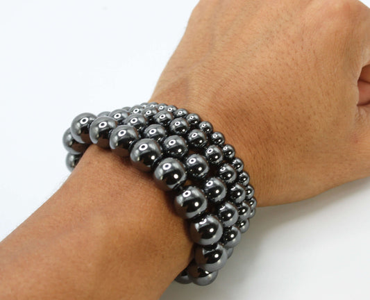 Handmade hematite bracelet with polished metallic-gray beads and magnetic clasp
