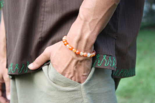 Handmade carnelian gemstone bracelet with warm orange and red beads