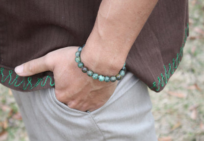 African Turquoise Bracelet - 8mm Gemstone Bead Jewelry for Men/Women - The Stone of Evolution and Renewal